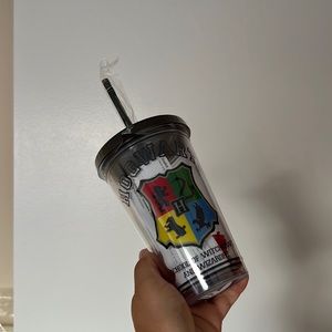 Harry Potter Hogwarts reusable cup with straw and ice cubes